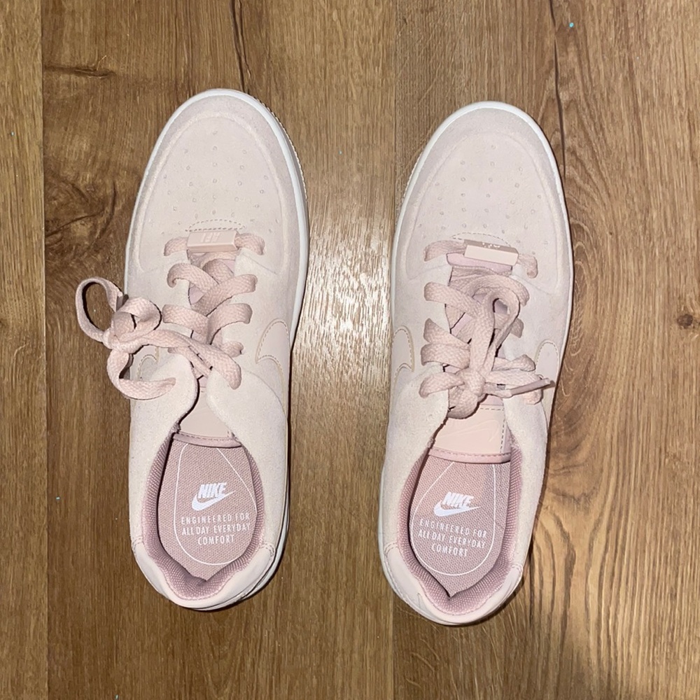 Pink Nike Air Force Ones.